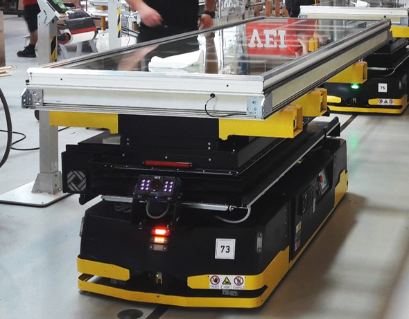 AGV that serves also as workbench, holding and moving the window